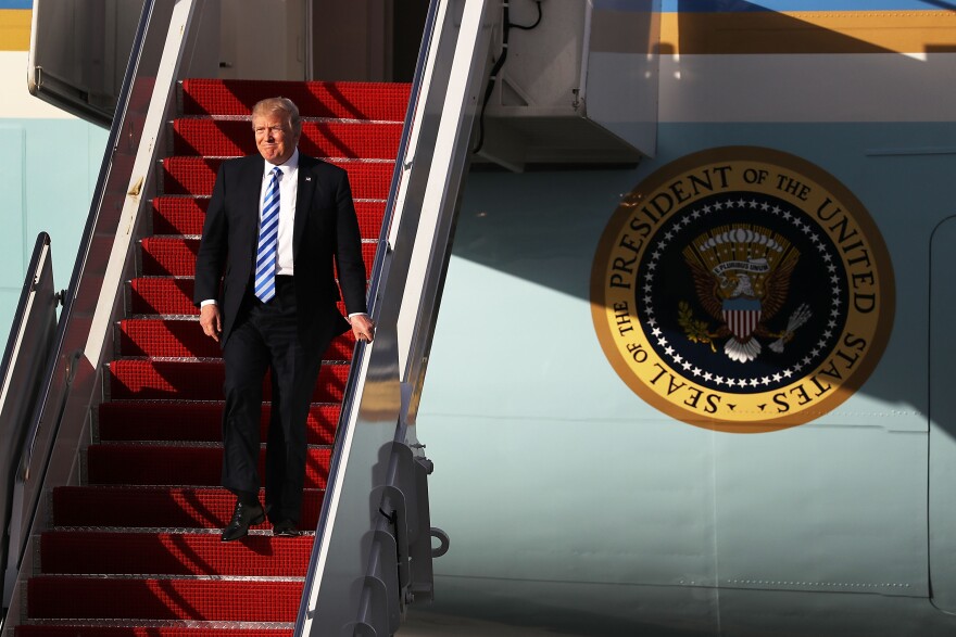 WEST PALM BEACH, FL - APRIL 13:  US President Donald Trump arrives on Air Force One at the Palm Beach International Airport to spend Easter weekend at Mar-a-Lago resort on April 13, 2017 in West Palm Beach, Florida. President Trump has made numerous trips to his Florida home and according to reports has cost over an estimated $20 million in his first 80 days in office.  (Photo by Joe Raedle/Getty Images)