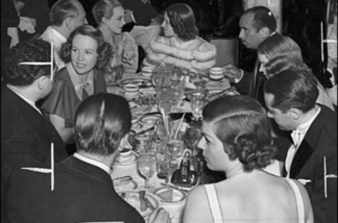 Dinner Party Download hosts Rico Gagliano (upper right) and Brendan Newnam (lower left, back to camera) fete Norma Shearer at a dinner party at the Biltmore in 1936.