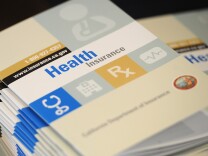 Booklets outlining health insurance options for Californians is seen at a Senior Information & Resource Fair in South Gate, California September 10, 2013 . 