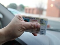 The new AB 60 driver's licenses are marked with the words "Federal Limits Apply."