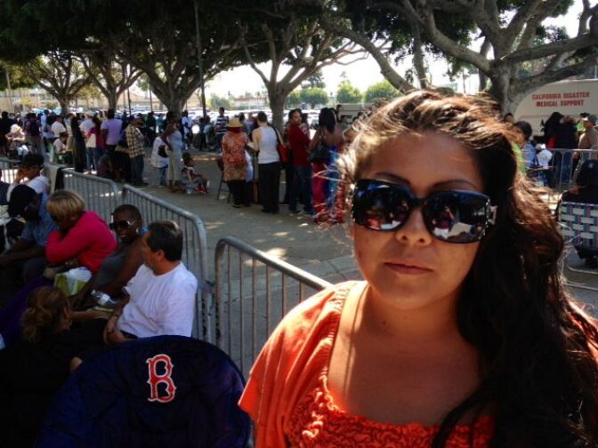 Claudia Robledo was first in line to get her wristband – no easy feat. She'd began to wait outside the grounds of the sports arena on Saturday night, and snagged her primo spot in line at 6 a.m. on Monday. (José Martinez/OnCentral)