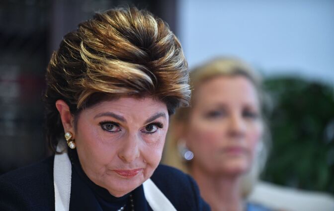 Attorney Gloria Allred speaks as another accuser of Roman Polanski watches during a press conference in Los Angeles, California on August 15, 2017.