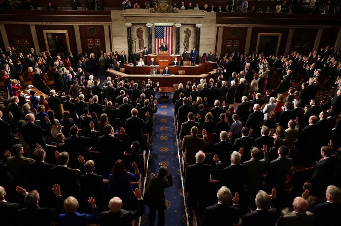 Speaker of the House John Boehner (R-OH) swears in the newly elected members of the first session of the 113th Congress in the House Chambers January 3, 2013 in Washington, DC. Congress has passed just 56 bills into law this session, the lowest number in its history. 