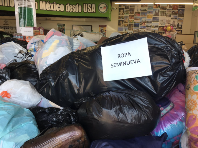 This sign on donated goods at a Mexico earthquake quake relief drop-off site in Lynwood says "semi-new clothes." Donations of used clothing aren't allowed into Mexico for public health reasons, officials say. But items like canned goods, personal hygiene items, blankets, tends, and new clothes are.