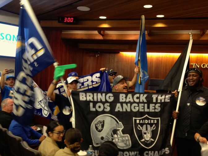 Supporters of an NFL stadium marched into the Carson city council meeting Tuesday night.