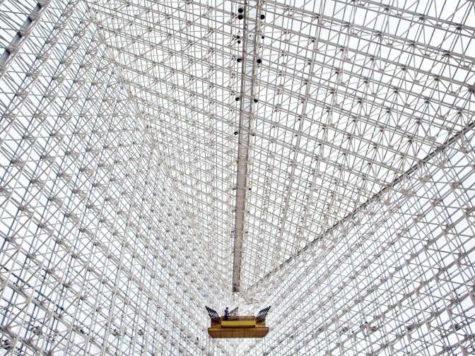 Parts of the Hazel Wright pipe organ hang high inside the Crystal Cathedral from all four sides of the building.