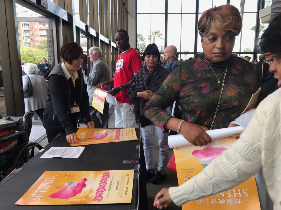 After the Shen Yun show at the Terrace Theater in Long Beach, audiences members are gifted posters.