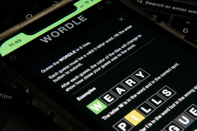 A close-up image of the game WORDLE on an iPhone screen. 