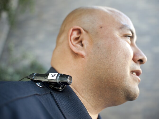 LAPD Officer Guillermo Espinoza wears a video camera on his lapel. Espinoza is one of 30 officers in the downtown area that began testing body cameras this month.