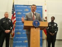 LAPD Chief Charlie Beck speaks to reporters at Police Headquarters in downtown Los Angeles. Police Captain Phil Tingirides (LA) and Tingirides' wife Emada (R), who is also an LAPD officer, were among those threatened in the Dorner online manifesto. 