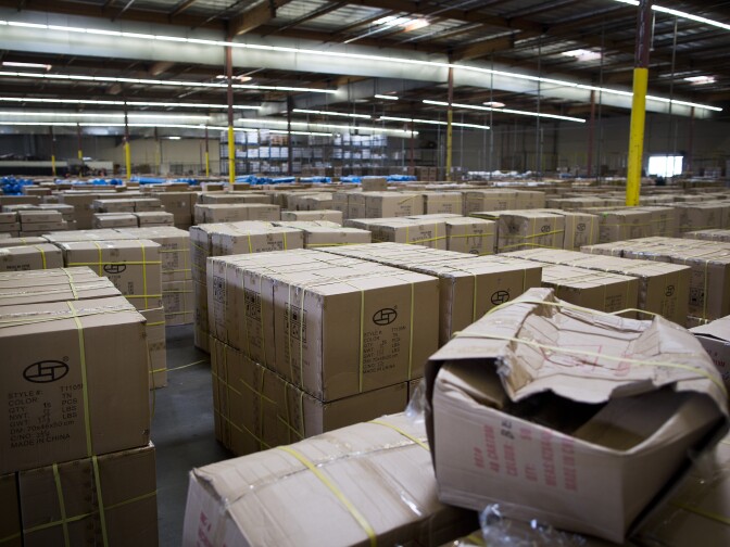 Boxes of items sit in a 260,000 square-foot warehouse in Carson. The space is one of the Port of Los Angeles/Long Beach's three warehouses for inspecting incoming goods.