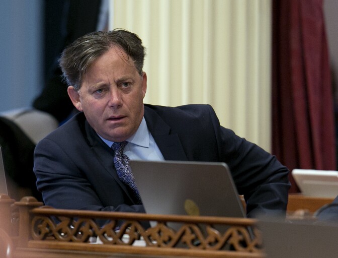 California state Sen. Josh Newman, D-Fullerton, left, listens as lawmakers debate a recall election measure Thursday, Aug. 24, 2017, in Sacramento.