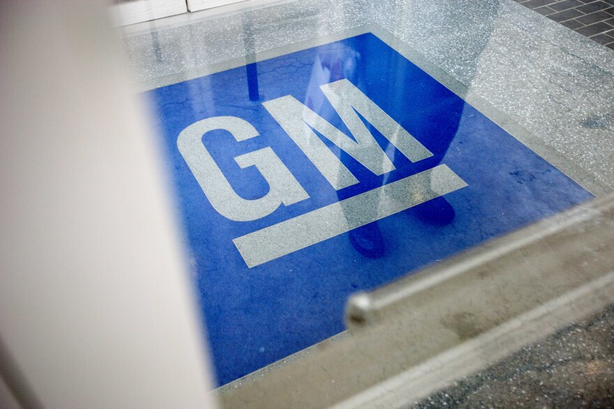 FILE - In this Thursday, Jan. 10, 2013 file photo, the logo for General Motors decorates the entrance at the site of a GM information technology center in Roswell, Ga. A congressional committee is investigating the way General Motors and a federal safety agency handled a deadly ignition switch problem in compact cars. House Energy and Commerce Committee Chairman Fred Upton of Michigan says the National Highway Traffic Safety Administration received a large number of complaints about the problem during the past decade. But GM didn’t recall the 1.6 million cars worldwide until last month. (AP Photo/David Goldman, File)