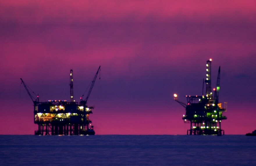 385757 05: Night comes to the Hogan, left, and Houchin oil and gas platform near the Federal Ecological Reserve in the Santa Barbara Channel, February 16, 2001, near Santa Barbara, CA. In recent months the state Coastal Commission has argued against the federal government in its lawsuit over offshore oil exploration, a case that could lead to more drilling near a marine sanctuary or leave up to 1 billion barrels of oil untapped. The tourism-heavy area relies on its coast to attract visitors and has been sensitive to oil drilling since a 3.3 million gallon spill from a platform in 1969 spawned an anti-drilling movement. (Photo by David McNew/Newsmakers)

