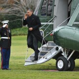 US President Barack Obama steps off Marine One on the South Lawn upon return to the White House on December 27, 2012 in Washington, DC. Obama returned to Washington under pressure to forge a year-end deal with Republicans to avoid the tax hikes and spending cuts of the 'fiscal cliff.'