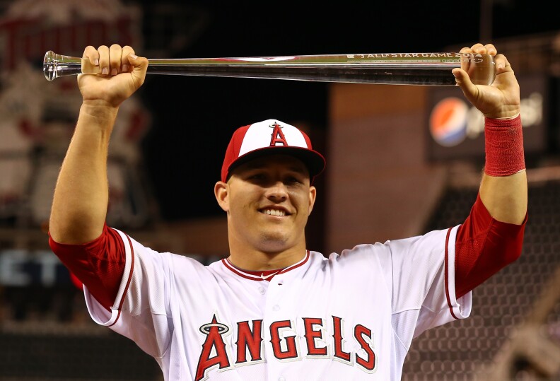 American League All-Star Mike Trout #27 of the Los Angeles Angels poses with the MVP trophy after a 5-3 victory over the National League All-Stars during the 85th MLB All-Star Game at Target Field on July 15, 2014 in Minneapolis, Minnesota. 