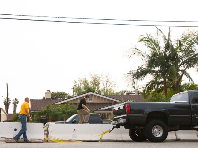Glendora residents near Rainbow Drive prepare for an upcoming storm onThursday, Dec. 11, 2014.

(Photos by Susanica Tam/ for KPCC)