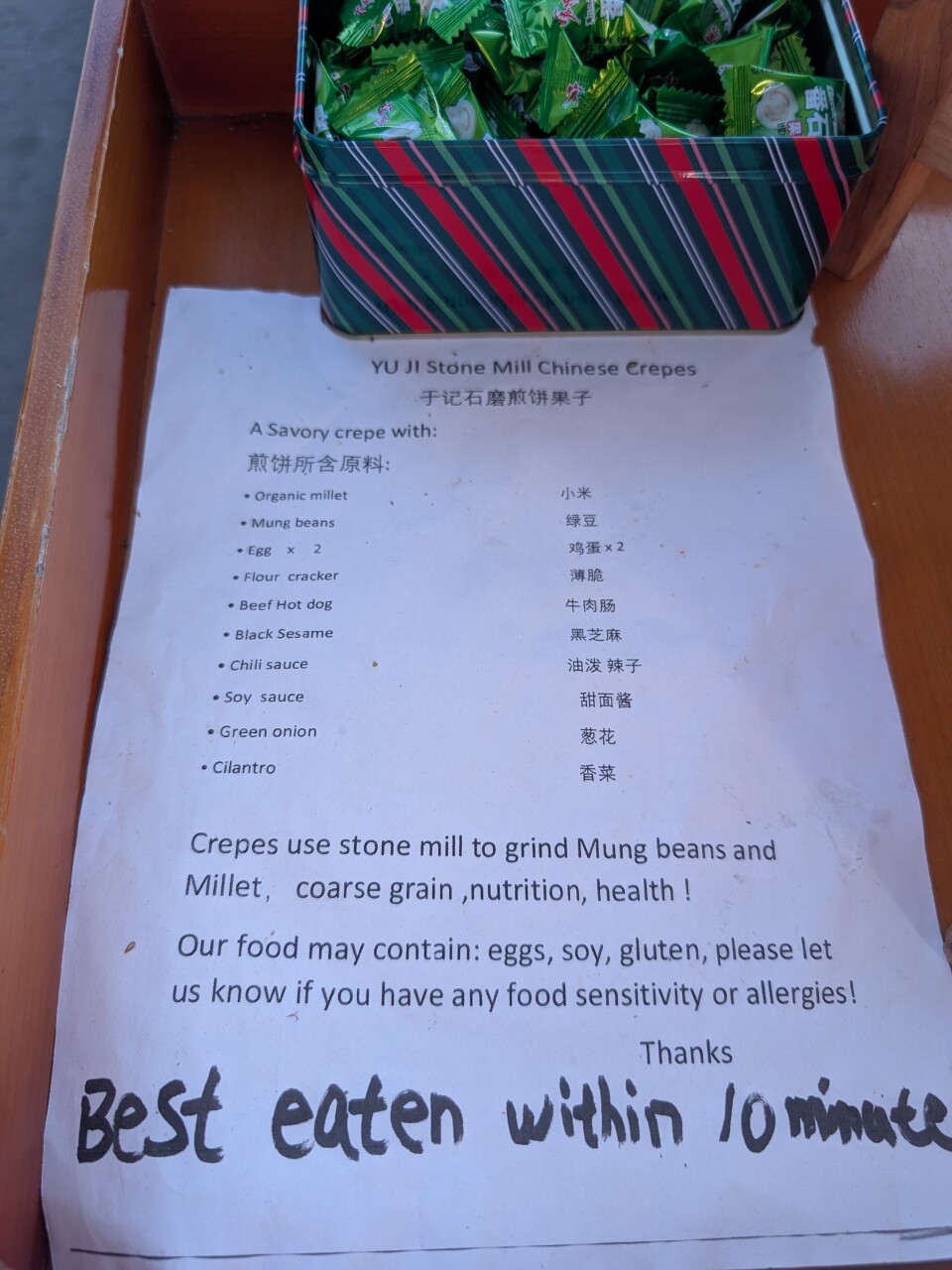 A paper with a list of ingredients like millet and mung beans on a list. It says, "best eaten within 10 minutes."