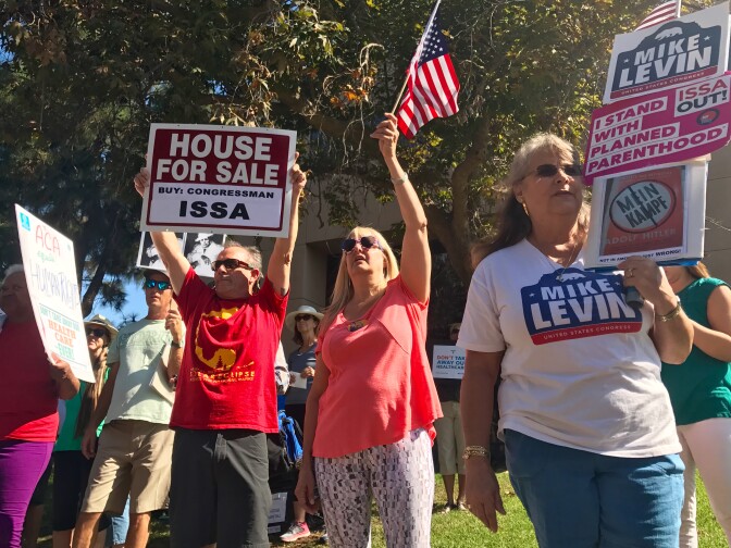 Protesters outside California Congressman Darrell Issa's Vista office in September 2017.