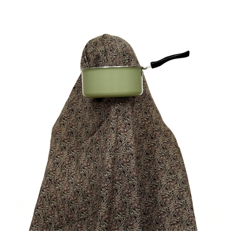 One example from Shadi Ghadirian's "Like Every Day" series is a commentary on the daily tasks that women are consigned to and defined by in Iranian culture.