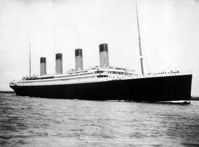 Starboard view of the White Star Line passenger liner R.M.S. Titanic embarking on its ill-fated maiden voyage. April 10, 1912, Near Liverpool, Merseyside, England, UK.