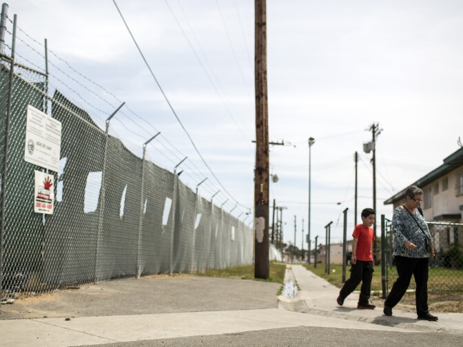 An old steel mill and truck repair facility, where lead and other toxins have been found, sits adjacent to Jordan Downs Housing Projects. The Department of Toxic Substances Control has agreed to review their decision that no cleanup was necessary.