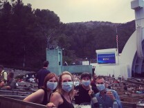 Concertgoers at the Hollywood Bowl wear face masks amid the smoke of the Sand Fire.