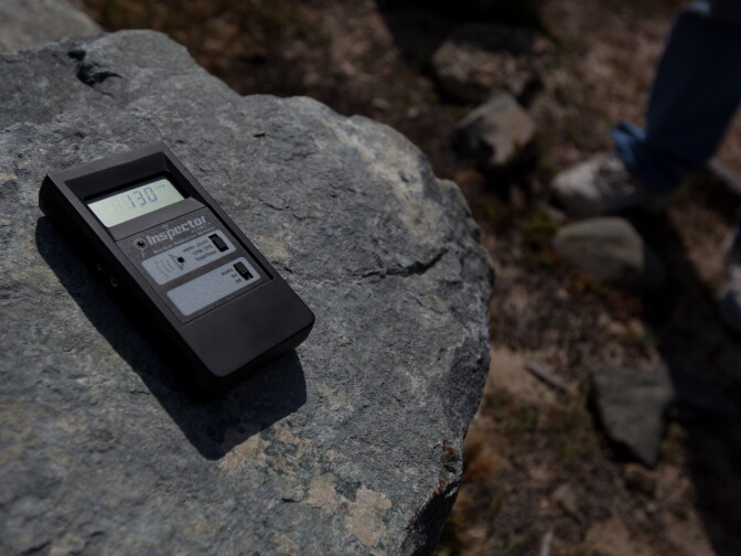 A geiger counter at an anti-nuclear portest near the San Onofre plant reads 130 CPMs. Normal background radiation usually hovers around 25 CPMs.