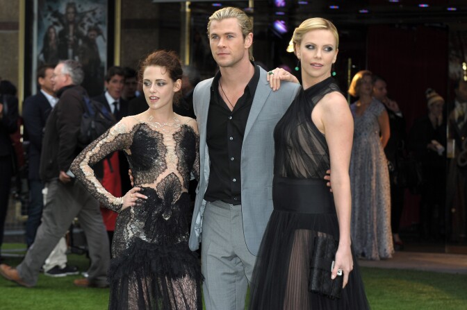 (L-R) Actors  Kristen Stewart, Chris Hemsworth, Chalize Theron  attend the World Premiere of 'Snow White And The Huntsman' at The Empire and Odeon Leicester Square on May 14, 2012 in London, England.
