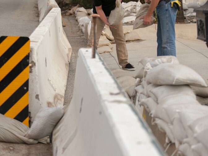 Glendora residents near Rainbow Drive prepare for an upcoming storm onThursday, Dec. 11, 2014.

(Photos by Susanica Tam/ for KPCC)