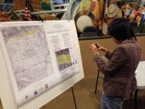 A woman takes a photo of the new Hollywood earthquake fault map released by the California Geological Survey Wednesday. 