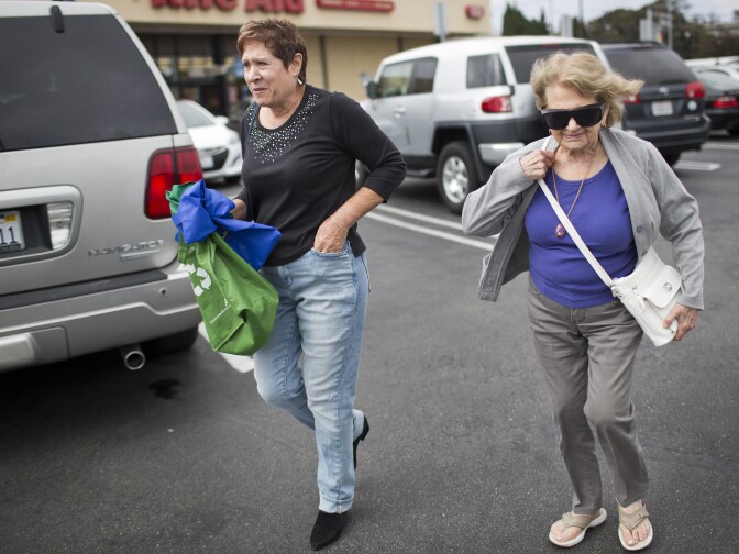 Lois Rubin, 66, left, and Shirley Ross, 95, go to the grocery store together on Monday afternoon, July 6, 2015 in West Los Angeles. The city is one of the hardest places in the country to find affordable housing, but it can be especially tough for seniors on fixed incomes.