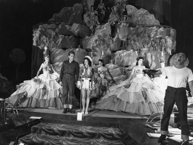 An undated photo showing cast members rehearsing a scene at the Earl Carroll Theatre.