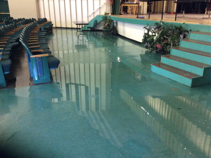 An L.A. County inspector's photo showing flooding in the auditorium at Inglewood High School.
