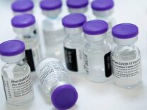 Vials of undiluted Pfizer COVID-19 vaccine are  prepared to administer to staff and residents at the Goodwin House Bailey's Crossroads, a senior living community in Falls Church, Virginia.