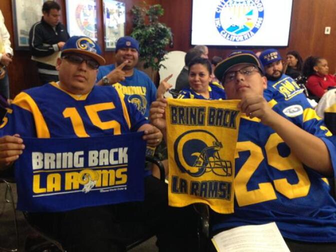L.A. Rams fans at an Inglewood City Council meeting on Tuesday, Feb. 24, 2015. This family — third generation Rams fans — drove from Riverside to show their support for moving the team back to L.A.
