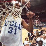 File: Then UCLA forward Ed O'Bannon cuts down the net after their 89-78 victory over Arkansas in the NCAA final at the Kingdome in Seattle on April 3, 1995.