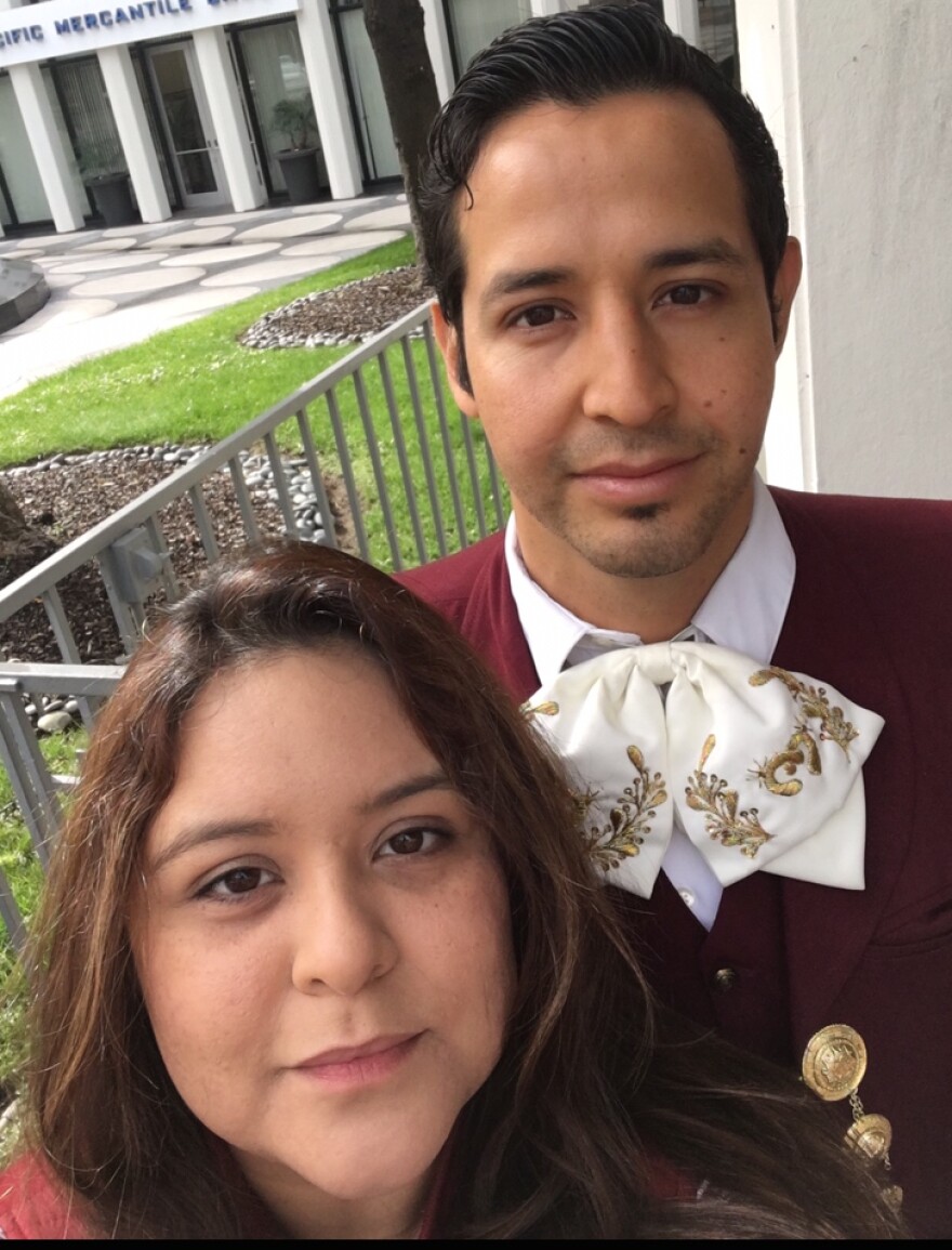 Karen Centeno and her husband Moises Hernandez are facing eviction from their Boyle Heights apartment on East 2nd Street. Rents have been rising as newcomers forced out by higher housing costs elsewhere move into the community.