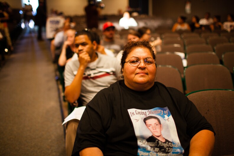 Orange County prosecutors Tuesday said an Anaheim police officer was legally justified when he shot and killed Joel Acevedo, 22, last year. The shooting of Acevedo and Manuel Diaz sparked violent protests in the city. (File photo: Genevieve Huizar, mother of Manuel Diaz, waits to speak at the Anaheim City Council meeting on August 8, 2012. After an unarmed Diaz was killed by Anaheim police in July, the community erupted in protest).