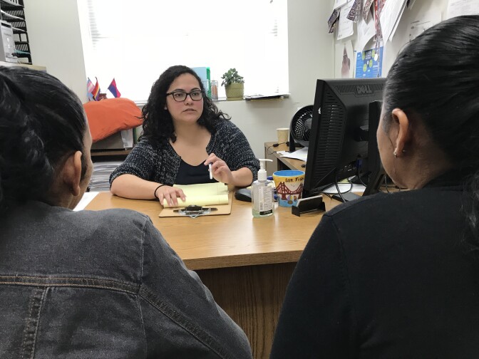 Patricia Ortiz meets with Rosa at the Esperanza Immigrant Rights Project offices in Los Angeles to discuss her asylum case, Dec. 5, 2018. 