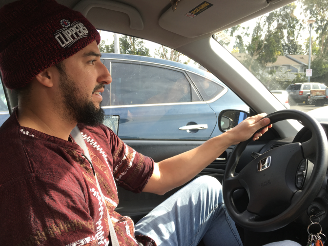 Peter Isais gets ready to drive to a cell phone repair job in Irvine. Isais, 34, depends on the work permit he has through the Deferred Action for Childhood Arrivals program, or DACA, to pay for his overhead and his tuition. He's studying how to do brain scans, a specialty for which he'll also need his work permit once he graduates. 