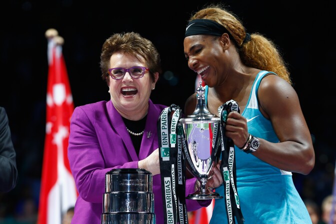 SINGAPORE - OCTOBER 26:  Serena Williams of USA shares a joke with Billie Jean King after her win over Simona Halep of Romania in the final during day seven of the BNP Paribas WTA Finals tennis at the Singapore Sports Hub on October 26, 2014 in Singapore.  (Photo by Julian Finney/Getty Images)