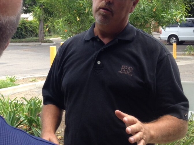 Robert Sjoquist, co-owner of Soils and Seeds Solutions in Camarillo, talks to a customer. He was surprised to find his longtime doctor was no longer in his Anthem Blue Cross PPO's provider network.