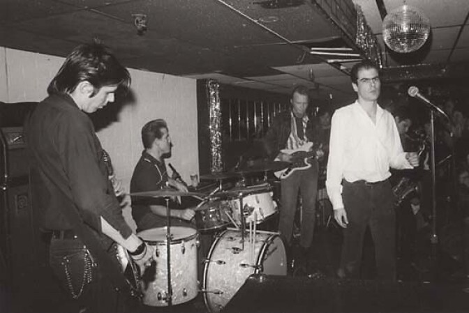 The Flesh Eaters, playing live. From left to right: John Doe, Bill Bateman, Dave Alvin, Chris Desjardins, and Steve Berlin.