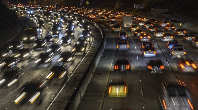 Cars and trucks are slowly moving during the evening's rush hour on Hollywood Freeway (Highwayy 101) in Los Angeles California on February 13, 2014.     AFP PHOTO / JOE KLAMAR        (Photo credit should read JOE KLAMAR/AFP/Getty Images)
