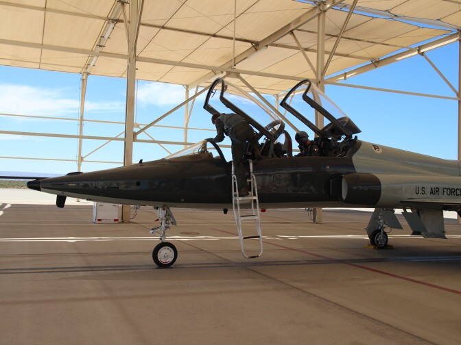 Justin Lechner gets into a T-38 supersonic jet for a practice run.