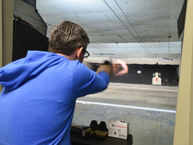 Brendan, who declined to give his last name, practices on the pistol range at On Target in Laguna Niguel on Saturday April 12 2014. 