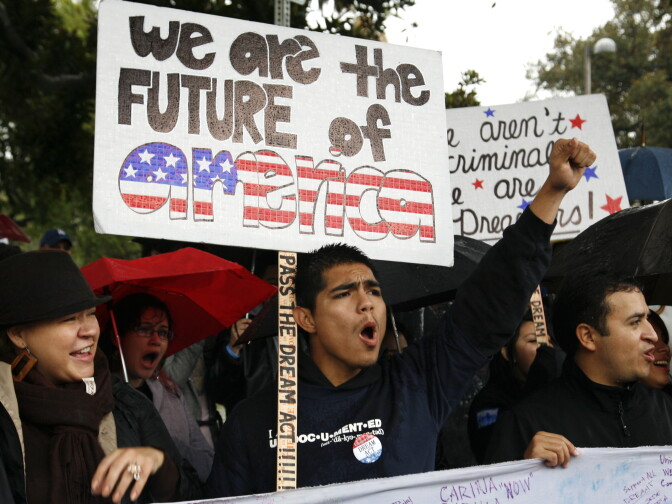 Undocumented college student Jorge Herrera, 18, center, of Carson rallies with students and Dream Act supporters in Los Angeles in Dec. 2010. 