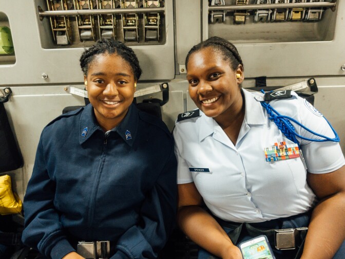 Air Force Junior Reserve Officer Training Corps cadet Alicia Spencer (right) is studying chemistry to work in forensic science someday.