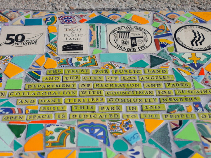 Local artists helped design the newly completed Serenity Park in Watts that includes exercise equipment, walking path and innovative playground equipment.